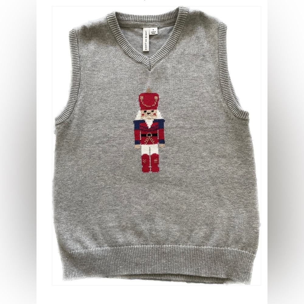 Nutcracker sweater vest and plaid shirt.